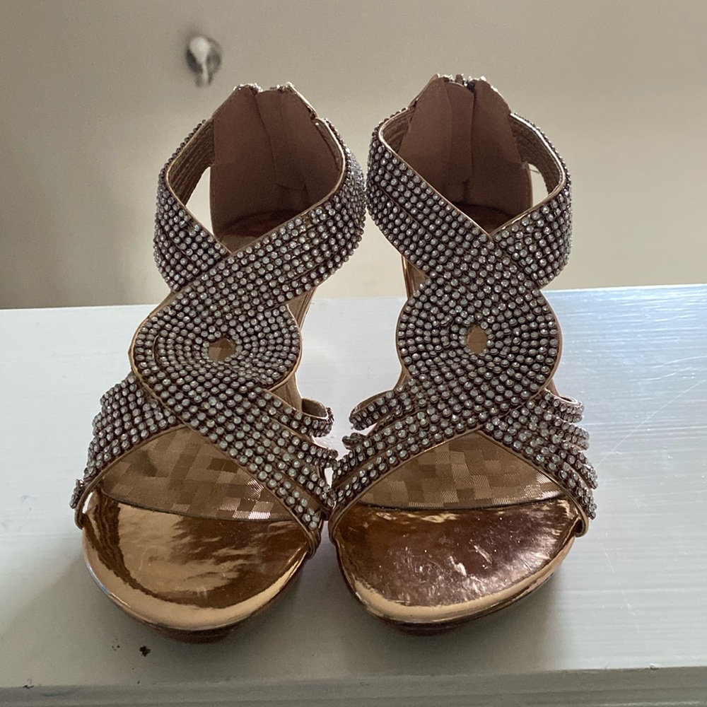 Shoes color/rose gold size =6.5 new never worn.